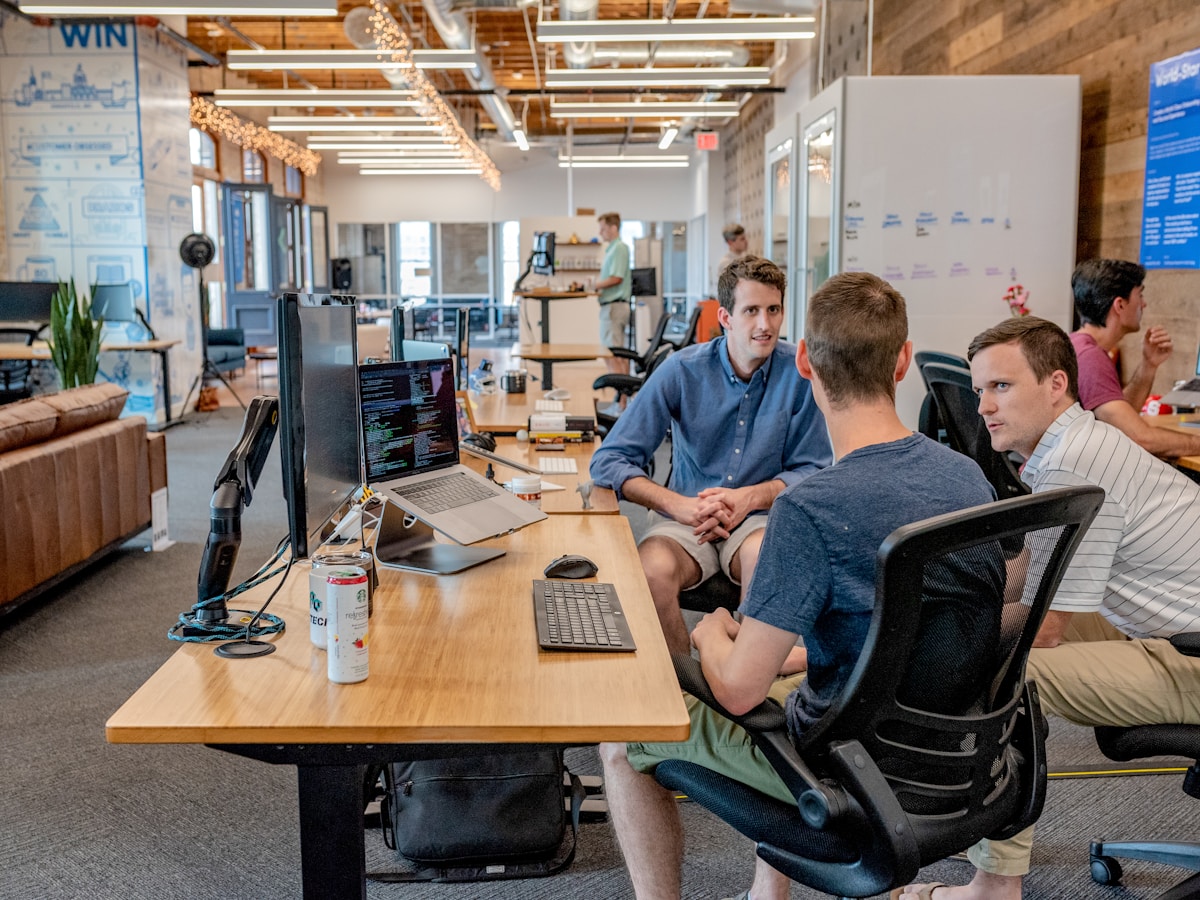 Entrepreneurs receiving startup guidance and support